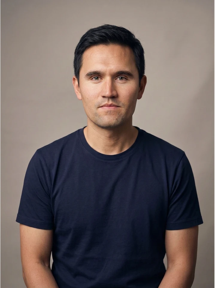 Charlie Kirk face-swap example retaining the navy shirt and pose